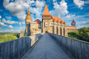 Captivating morning view of Hunyad Castle / Corvin's Castle with wooden bridge.