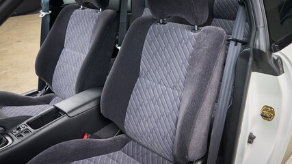 Passenger seat in a car