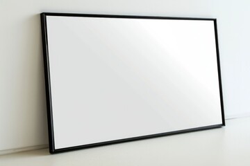 A picture frame leaning against a wall in a room. Suitable for interior design concepts