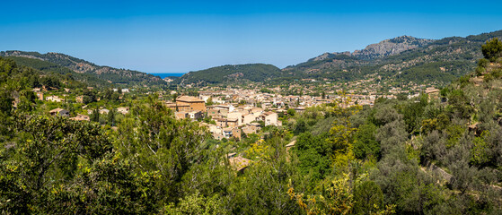 Expansive view of Sóller district Urbanització de Sa Sínia to the azure Mediterranean sea,...