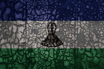 flag of lesotho on a old grunge metal rusty cracked wall background