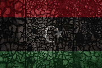 flag of libya on a old grunge metal rusty cracked wall background
