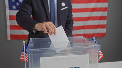 Young hispanic man in suit voting at american electoral college with us flag background