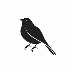 Obraz premium Minimalist blackbird silhouette on a white background.