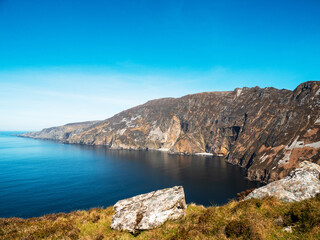 Fototapeta premium View on amazing Slieve league Cliff, county Donegal, Ireland. Popular travel landmark area with stunning nature view and hiking route. Nobody. Warm sunny day. Travel and tourism
