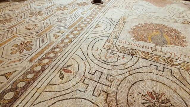 Stunning mosaic floor in geometric motifs at the Crypt of Santa Reparata, Florence Cathedral, Cattedrale di Santa Maria del Fiore or Duomo in Tuscany, Italy