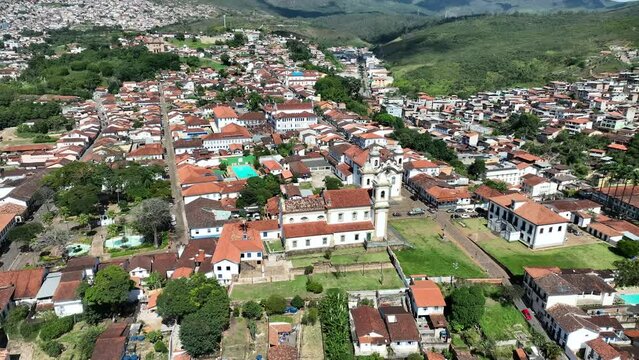 Explore the stunning S&atilde;o Francisco de Assis Church in Mariana, Minas Gerais, Brazil, in the daylight, captured with the powerful DJI Mavic 3 drone. Discover the beauty and grandeur of this historical 