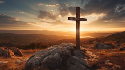 Wooden Cross on Rocky Hilltop at Sunset