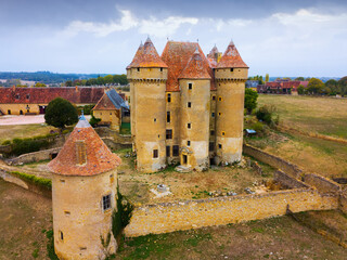 Aerial view of impressive medieval castle of Sarzay located in commune of same name in Indre...