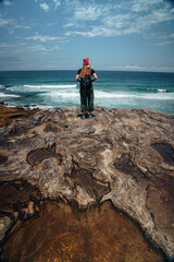 Girl with Christmas Hat at Beach, Summer Christmas at the Sea,, Frau mit Nikolausmütze am Strand