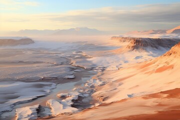 Dramatic desert landscape with mountains and hazy sky