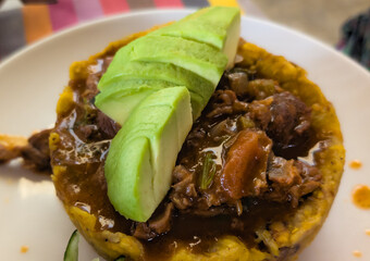 Typical Dominican food called chivo con mofongo