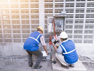 The validation team is checking electricity meters at industrial power plants.