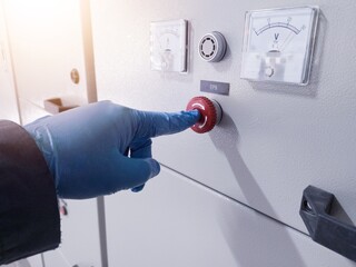 A hand engineer push the Emergency Push Botton on panel control when emergency condition.How to use...