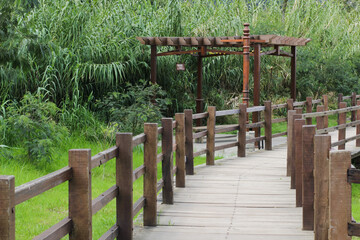 Aesthetic wooden bridge in Sikidan Crater, Dieng.