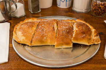 Stromboli stuffed with four cheeses