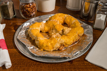 Soft pretzel with crab dip and cheese