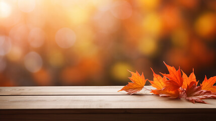 autumn leaves on the wooden table