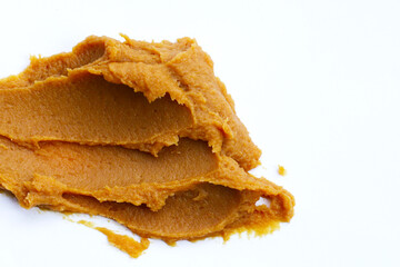 Japanese miso paste on white background.