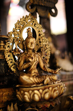 Lalitpur (Patan), Nepal &ndash; April 26, 2023: Gilt Copper Shiva Figurine in Golden Temple (Hiranya Varna Mahavihar or Kwa Bahal)