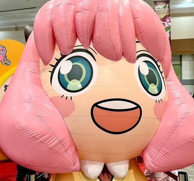 Jakarta, Indonesia - May 5th, 2024 -  Cute Anya Forger balloon character from Spy x family. Anime festival events at AFA Anime Festival Asia 2024 in JCC Jakarta Convention Centre.