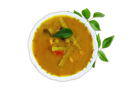 traditional South Indian Food curry sambhar or sambar dal rasam with curry leaves or curry patta for Onam festival,cutout in transparent background,png format