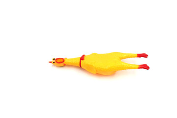 cute rubber chicken toy on white background