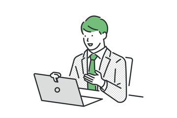 リモート会議をするスーツの男性