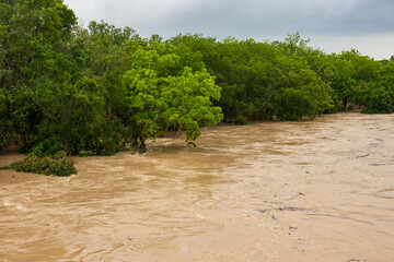 The Lampasas River rushes and roars through the Texas Hill Country, leaving a trail of flood damage...