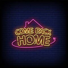 Obraz premium come back home neon Sign on brick wall background vector