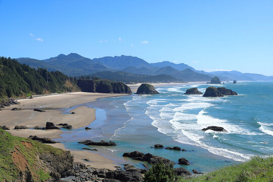 View from Ecola State Park Viewpoint overlooking Crescent Beach and in the distance Canon Beach with its famous Haystack Rock - Oregpn, Pacific Northwest