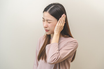 Tinnitus concept, sick asian young woman, girl have ear pain or earache, hand touch plug ear,...