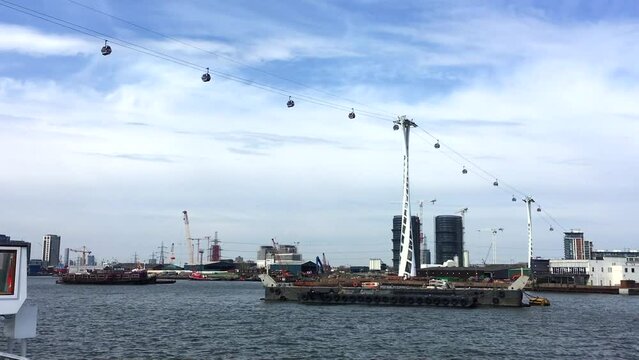IFS Cloud Emirates Cable Car London in Greenwich over the River Thames.
