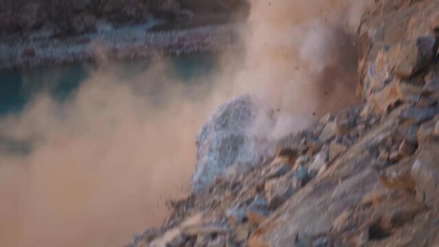 Rocks falling from mountain due to landslide in Manali, Himachal Pradesh, India. Natural calamity. Natural disaster in mountains during monsoon. Stones falling.