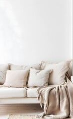 Beige sofa with a beige blanket and pillows in a minimalistic interior of a modern living room with a scandinavian home decor style