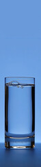 Fresh, clean water fills a glass, epitomizing purity and rejuvenation