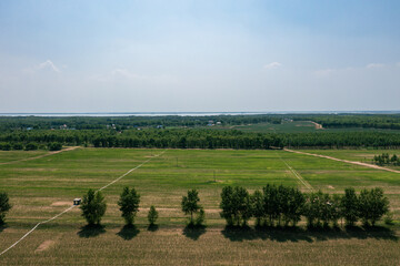 Obraz premium Aerial photography of riverside wetland grassland