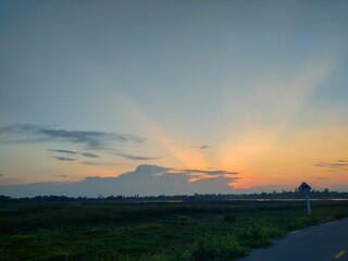 Obraz premium sunset over the river