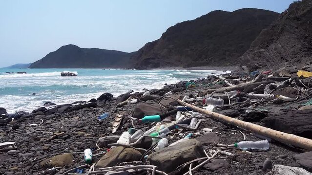 marine garbage debris driftwood Styrofoam Polystyrene foam. Plastic box on deserted shore magnificent coastline stretches behind, Environmental pollution issues.