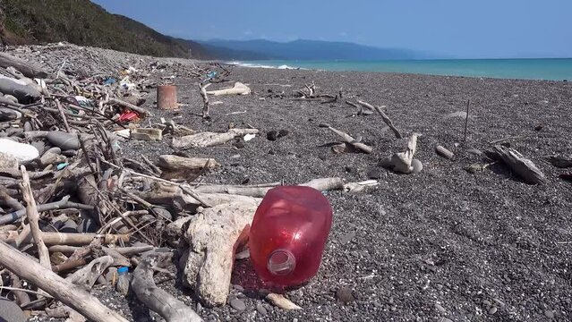 marine garbage debris driftwood Styrofoam Polystyrene foam. Plastic box on deserted shore magnificent coastline stretches behind, Environmental pollution issues.