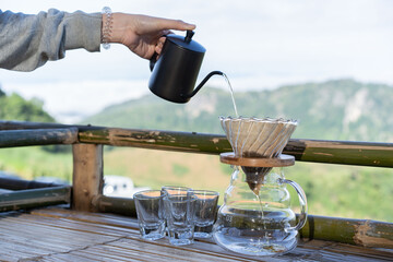 Pouring coffee in the morning in northern Thailand