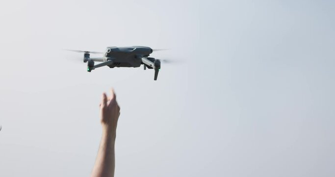 Drone Pilot Releasing Drone Camera From Its Hand. - close up shot