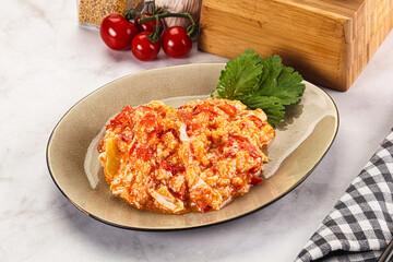 Shakshuka with tomato for breakfast