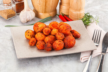 Baked young potato with paprika