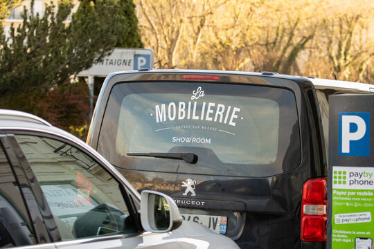 France, 30 March 2024: La Mobilerie showroom advertisement on a vehicle in a parking lot.