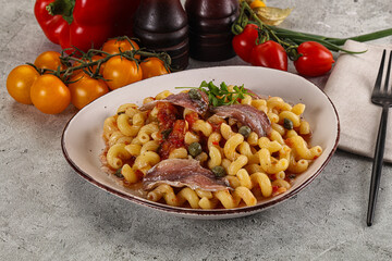 Italian pasta cellentani with anchovy