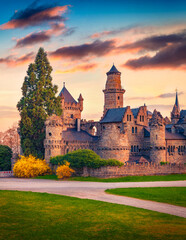 Obraz premium Captivating summer view of Lowenburg Castle, Kassel location, German, Europe. Gorgeous morning scene of Schlospark. Traveling concept background.