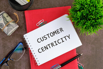 Client centricity business orientation. Customer first concept. Inscription: CUSTOMER CENTRICITY on...