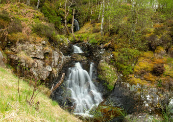 Beautiful waterfall between rocks in the forest