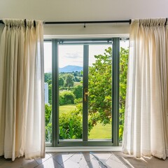 Fototapeta premium White curtain or blinds serving as sun protection in an office with a view of the garden